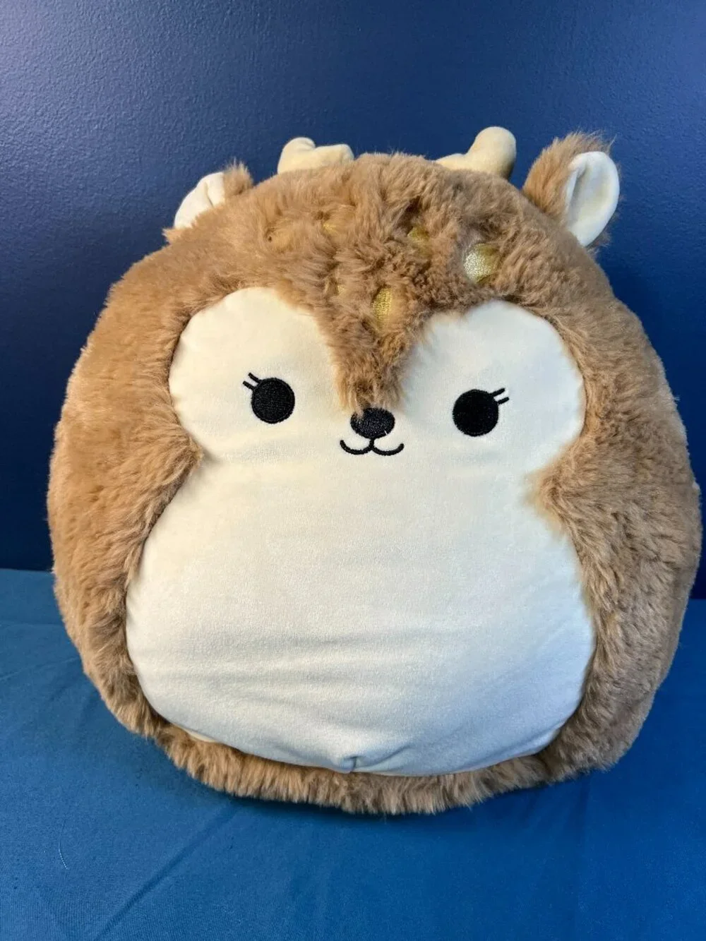 Squishmallows 12-inch Dawn the Fawn Fuzz-A-Mallows line plush toy.
